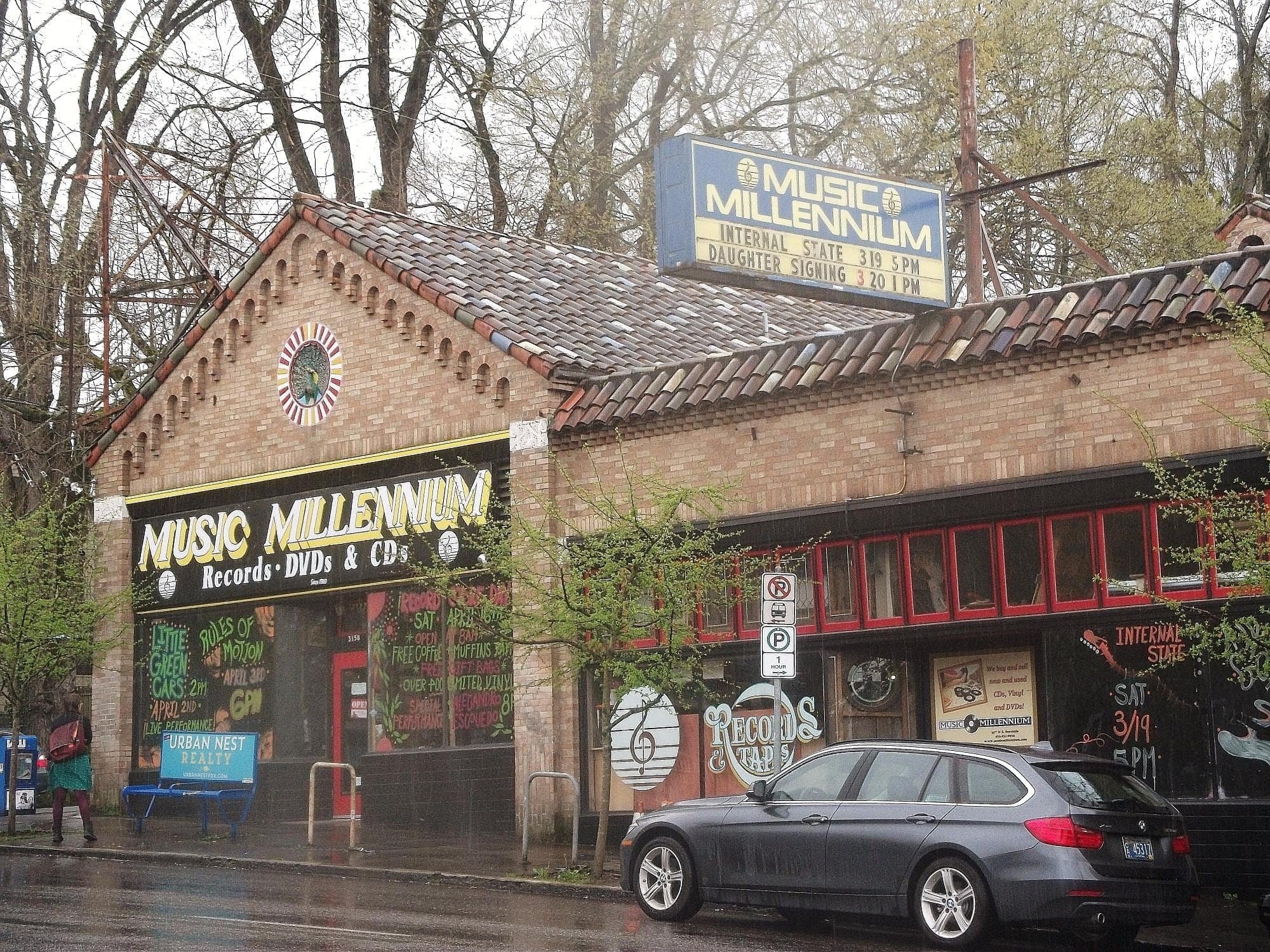 Music Millennium's original East Burnside storefront showing the iconic signage and vinyl displays